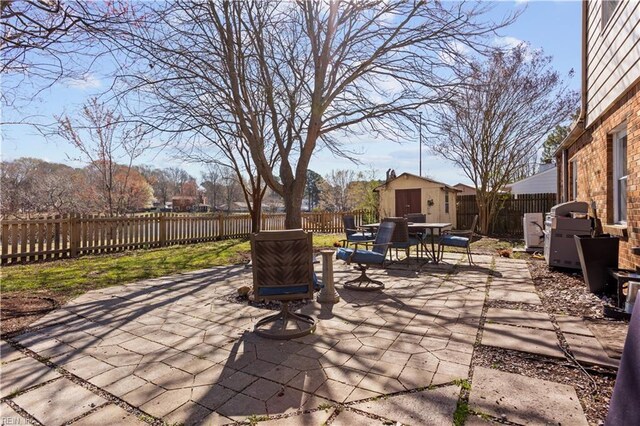 view of patio / terrace with a fenced backyard and outdoor dining space