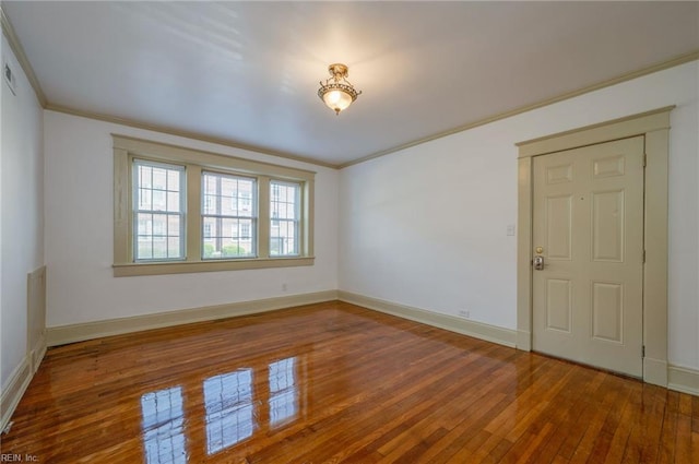 911 Spotswood Ave Unit 6, Norfolk, VA 23517 - empty room featuring wood-type flooring, crown molding, and baseboards