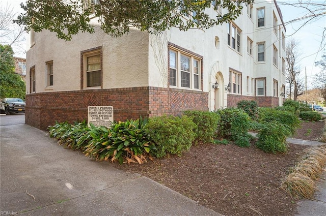 911 Spotswood Ave Unit 6, Norfolk, VA 23517 - view of side of home with brick siding and stucco siding