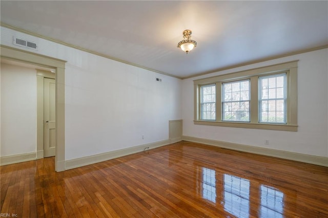 911 Spotswood Ave Unit 6, Norfolk, VA 23517 - unfurnished room with ornamental molding, wood-type flooring, and baseboards