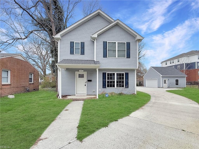 520 Harriett St, Hampton, VA 23669 - view of front facade with driveway, a garage, an outdoor structure, and a front yard