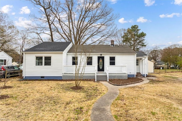ranch-style house featuring a front yard and crawl space