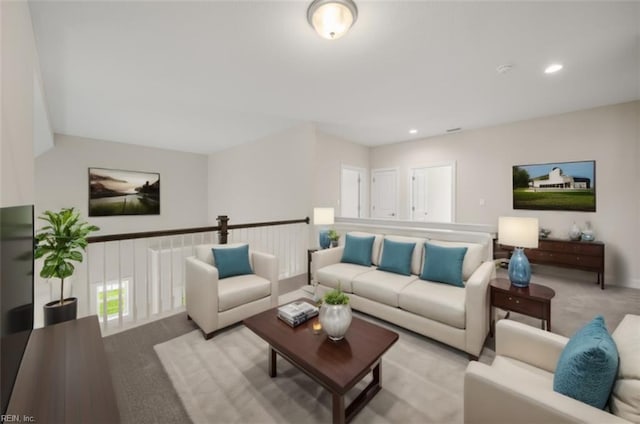 living area with recessed lighting and carpet