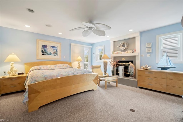 832 Surfside Ave, Virginia Beach, VA 23451 - carpeted bedroom featuring a fireplace with raised hearth, access to outside, recessed lighting, and ceiling fan