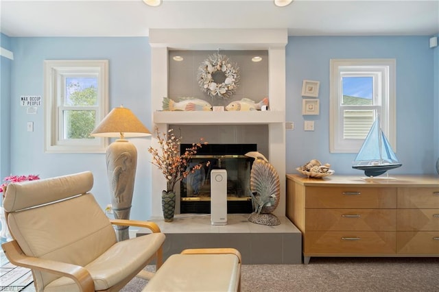 832 Surfside Ave, Virginia Beach, VA 23451 - sitting room with a tiled fireplace and plenty of natural light