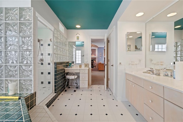 832 Surfside Ave, Virginia Beach, VA 23451 - bathroom featuring vanity, visible vents, a fireplace, and walk in shower