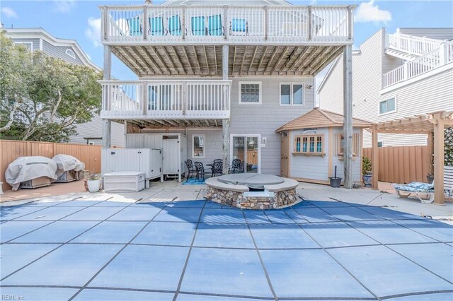 832 Surfside Ave, Virginia Beach, VA 23451 - rear view of property with a pergola, fence, and a patio