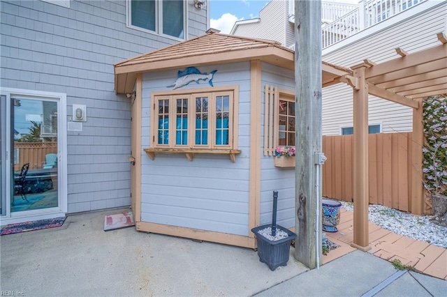 832 Surfside Ave, Virginia Beach, VA 23451 - doorway to property with a patio, fence, and a pergola