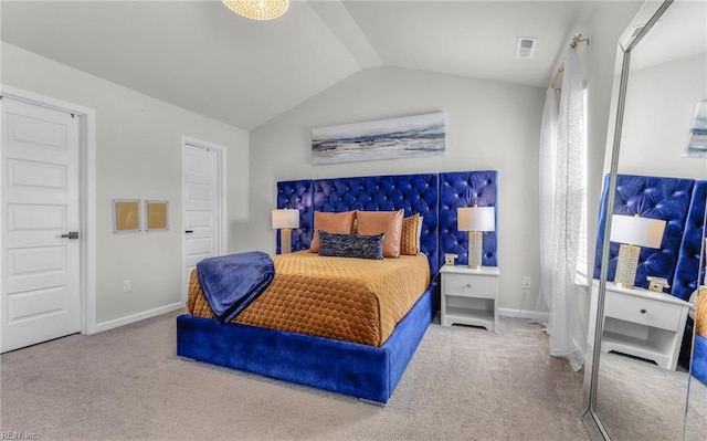 bedroom with baseboards, carpet floors, lofted ceiling, and visible vents