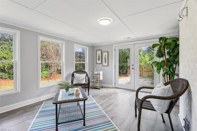 sunroom featuring french doors
