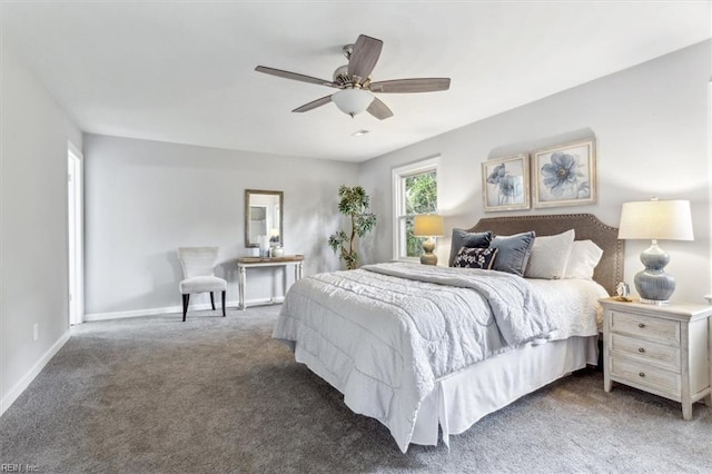 bedroom with baseboards, carpet flooring, and a ceiling fan