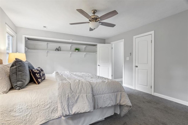 bedroom featuring baseboards, ceiling fan, and carpet