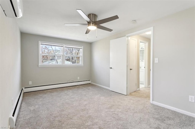 unfurnished bedroom with carpet floors, an AC wall unit, baseboards, and a baseboard heating unit