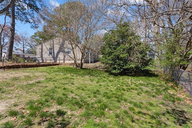 view of yard featuring fence