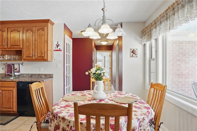 421 Richneck Rd, Newport News, VA 23608 - dining space featuring a textured ceiling, light tile patterned floors, and a chandelier