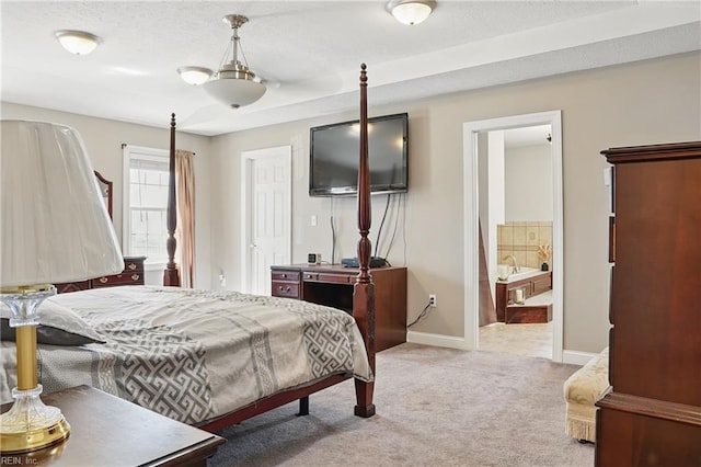 421 Richneck Rd, Newport News, VA 23608 - bedroom with baseboards, ensuite bath, and light carpet