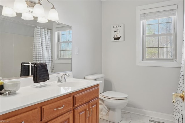 421 Richneck Rd, Newport News, VA 23608 - bathroom with baseboards, visible vents, toilet, and vanity