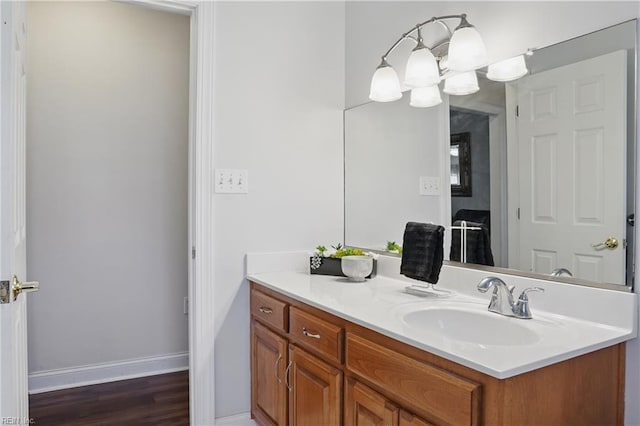 421 Richneck Rd, Newport News, VA 23608 - bathroom with vanity, baseboards, and wood finished floors
