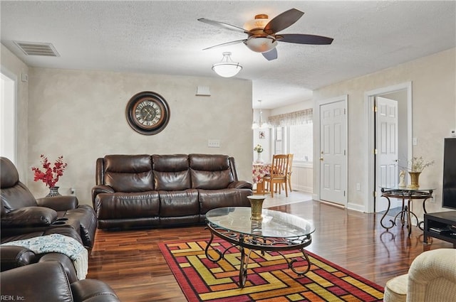 421 Richneck Rd, Newport News, VA 23608 - living area with a textured ceiling, ceiling fan, visible vents, and wood finished floors