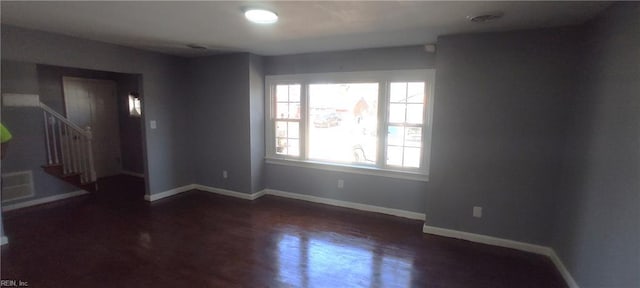 1116 Faubus Dr, Newport News, VA 23605 - empty room with baseboards, stairs, and wood finished floors