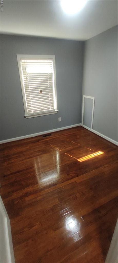 1116 Faubus Dr, Newport News, VA 23605 - unfurnished room with baseboards, visible vents, and wood finished floors