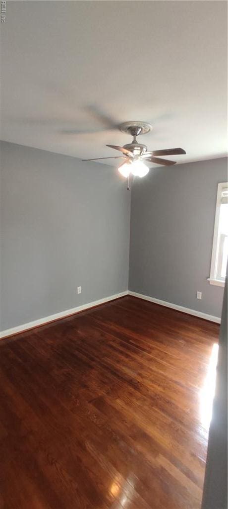 1116 Faubus Dr, Newport News, VA 23605 - empty room featuring dark wood finished floors, baseboards, and a ceiling fan