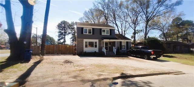 1116 Faubus Dr, Newport News, VA 23605 - view of front of house with fence and dirt driveway
