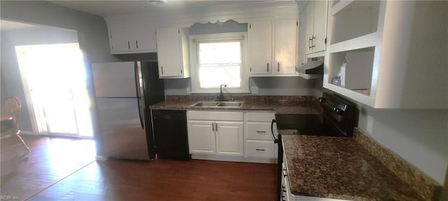 1116 Faubus Dr, Newport News, VA 23605 - kitchen with white cabinetry, under cabinet range hood, a sink, and black appliances