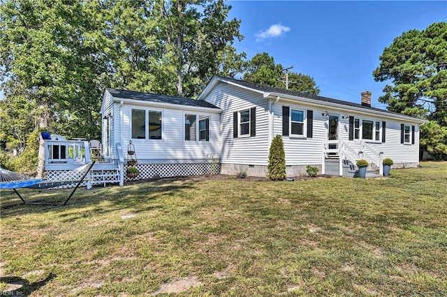 38 Callis Ln, Deltaville, VA 23043 - ranch-style home with a wooden deck, a front yard, crawl space, and a chimney
