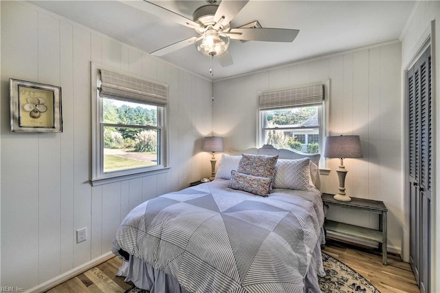 38 Callis Ln, Deltaville, VA 23043 - bedroom featuring ceiling fan and wood finished floors