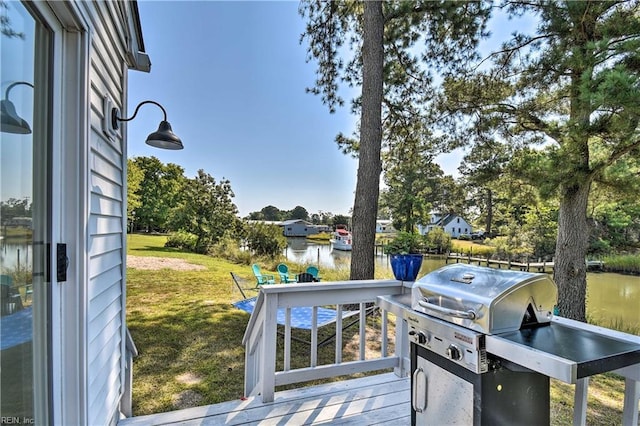 38 Callis Ln, Deltaville, VA 23043 - deck featuring a lawn, a water view, and area for grilling
