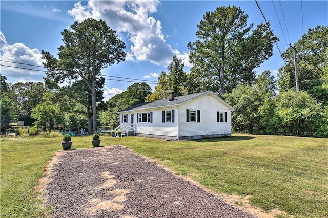 38 Callis Ln, Deltaville, VA 23043 - view of front of house with entry steps, crawl space, and a front yard
