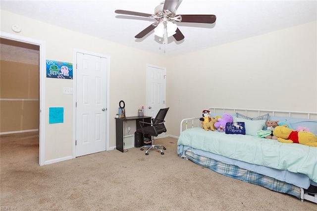 bedroom with carpet, baseboards, and ceiling fan