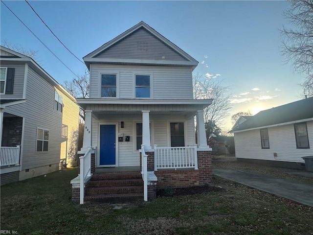 422 Homestead Ave, Hampton, VA 23661 - view of front of property with a front yard and a porch