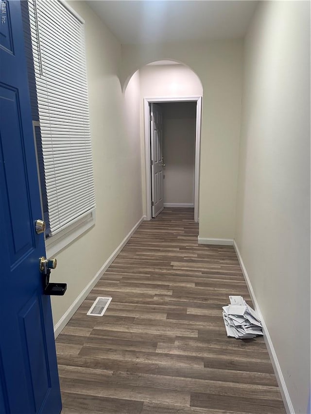 422 Homestead Ave, Hampton, VA 23661 - corridor with baseboards, visible vents, arched walkways, and dark wood-style flooring