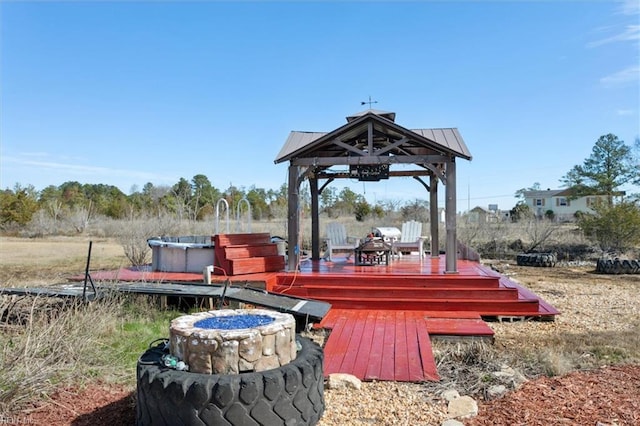 wooden deck featuring a gazebo