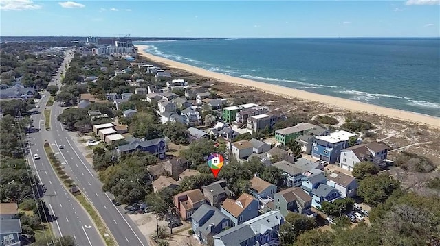 bird's eye view featuring a view of the beach and a water view
