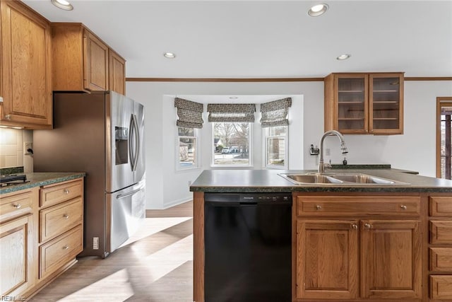 127 Freemoor Dr, Poquoson, VA 23662 - kitchen featuring dark countertops, recessed lighting, black dishwasher, glass insert cabinets, and a sink