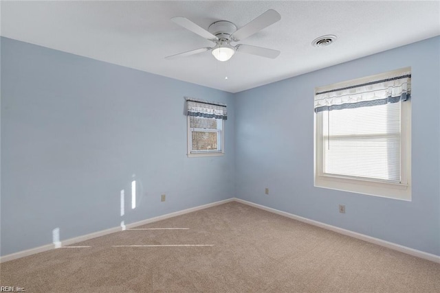 127 Freemoor Dr, Poquoson, VA 23662 - carpeted empty room with a ceiling fan, baseboards, and visible vents