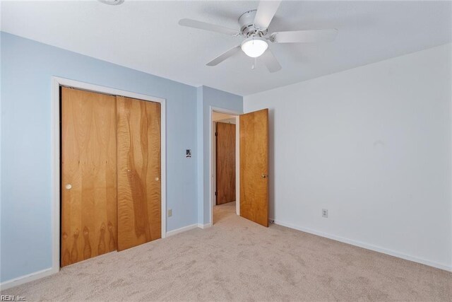 127 Freemoor Dr, Poquoson, VA 23662 - unfurnished bedroom with a closet, carpet floors, ceiling fan, and baseboards