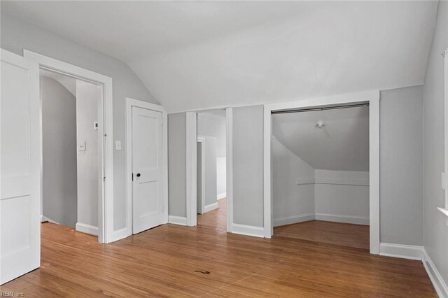33 Mennonite Ln, Newport News, VA 23602 - bonus room featuring baseboards, wood finished floors, and vaulted ceiling