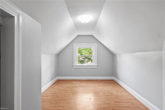 33 Mennonite Ln, Newport News, VA 23602 - additional living space with baseboards, vaulted ceiling, and wood finished floors