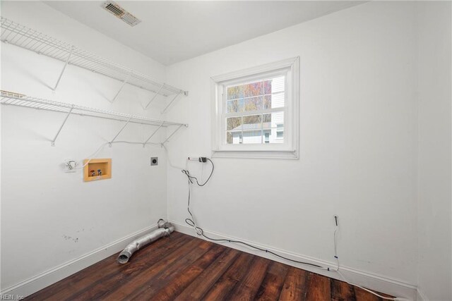 clothes washing area with dark wood-style flooring, visible vents, electric dryer hookup, laundry area, and washer hookup