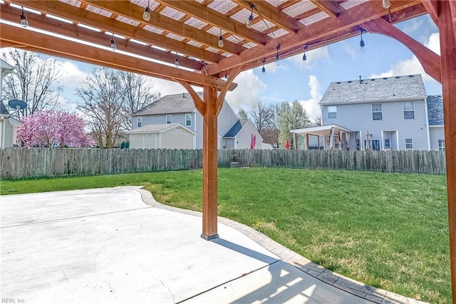view of yard featuring a fenced backyard, a pergola, and a patio