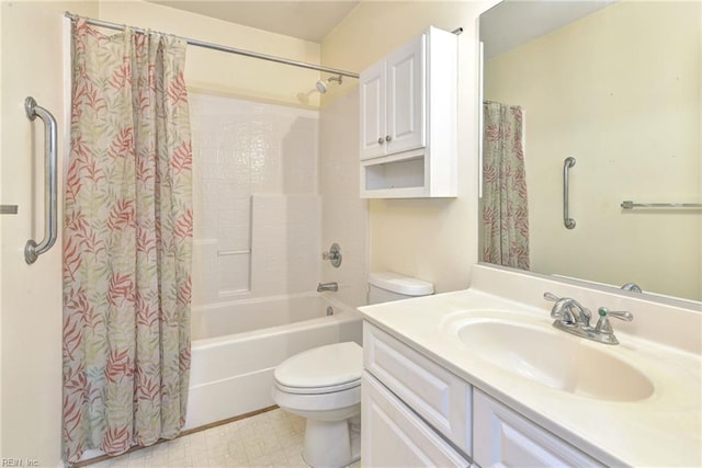bathroom with tile patterned floors, vanity, shower / bath combination with curtain, and toilet