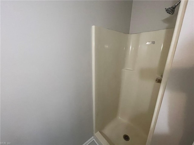 bathroom featuring a stall shower
