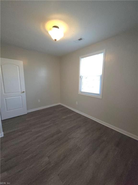 816 Westwood Ave, Hampton, VA 23661 - empty room with dark wood-style flooring, baseboards, and visible vents