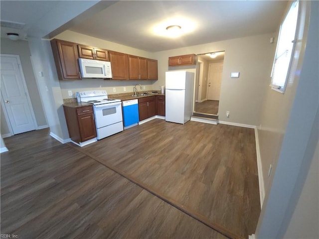 816 Westwood Ave, Hampton, VA 23661 - kitchen with baseboards, dark wood finished floors, a sink, and white appliances
