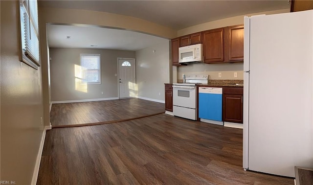 816 Westwood Ave, Hampton, VA 23661 - kitchen featuring white appliances, arched walkways, baseboards, and dark wood-style flooring
