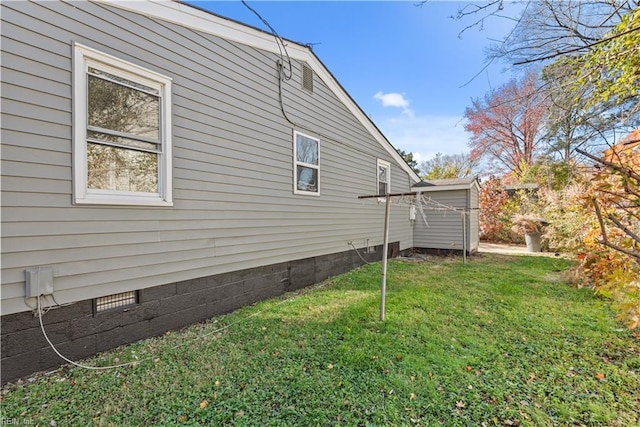 view of property exterior with crawl space and a yard
